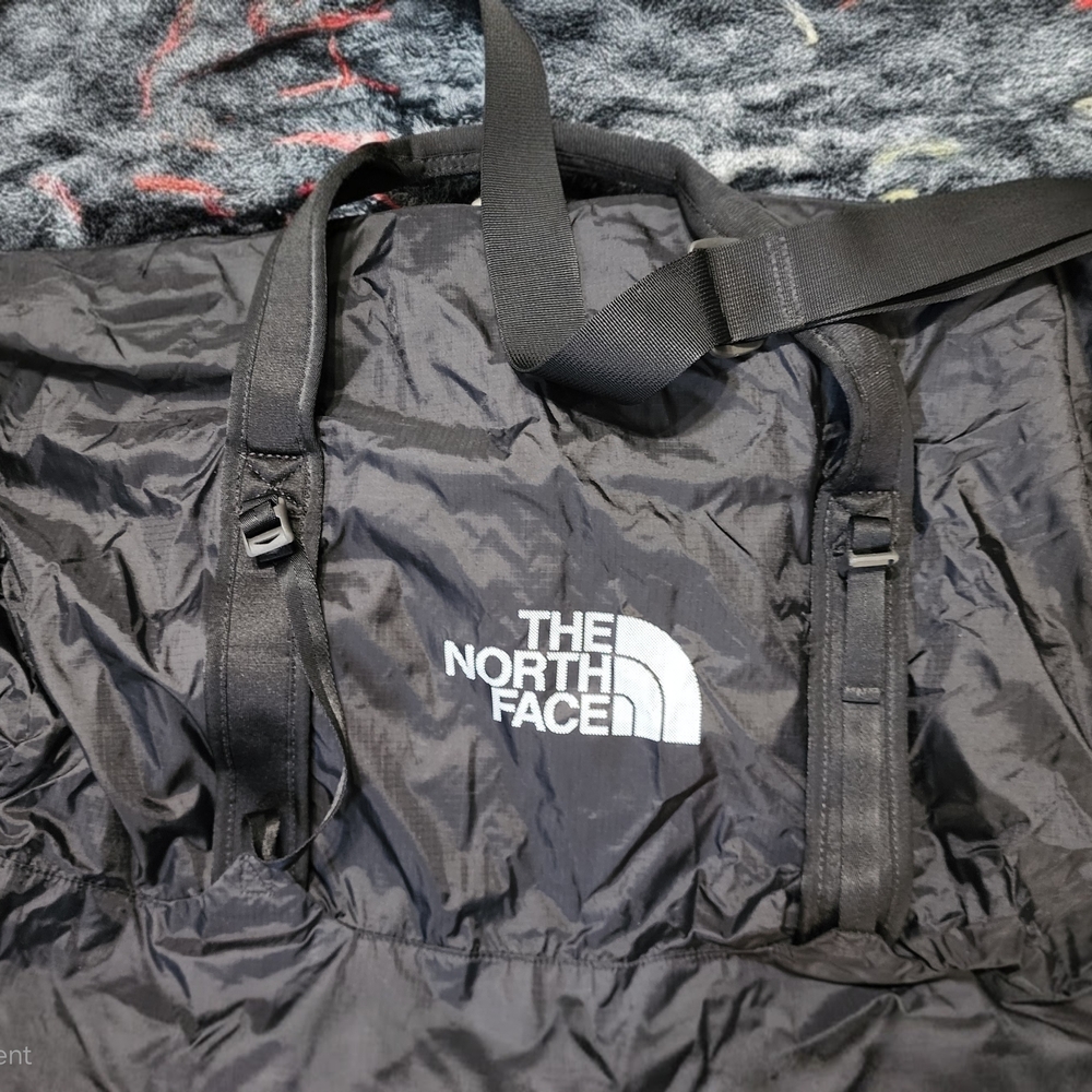 The North Face Black Duffel Bag with Weather-Resistant Material